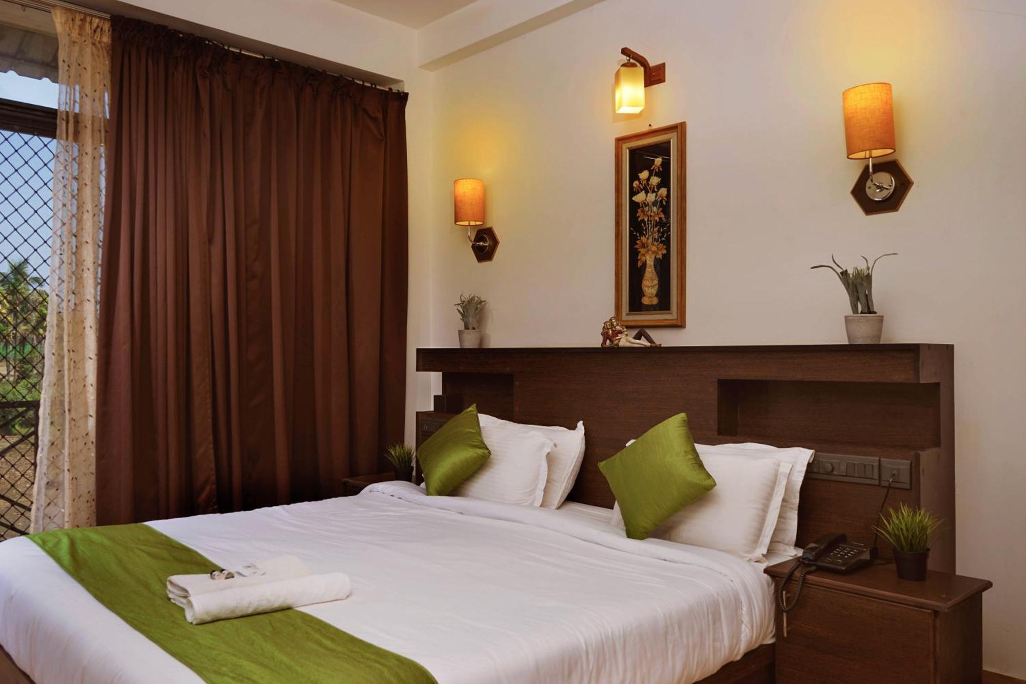 Paddyfield Inn Манантавади Номер фото