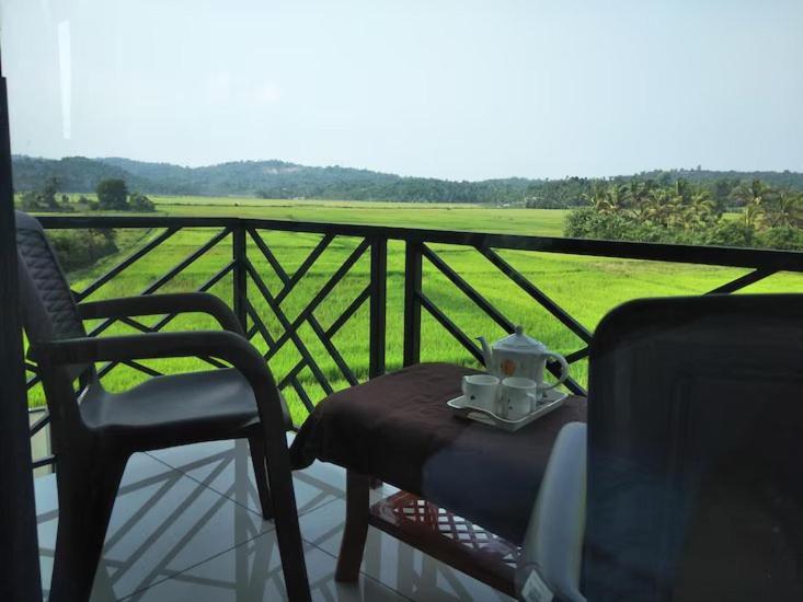 Paddyfield Inn Манантавади Экстерьер фото