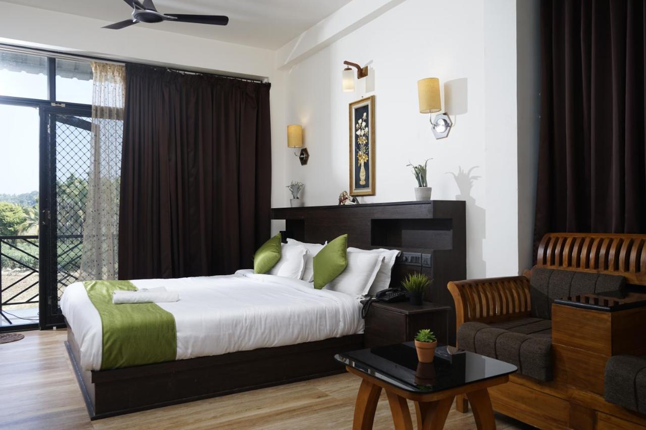 Paddyfield Inn Манантавади Экстерьер фото